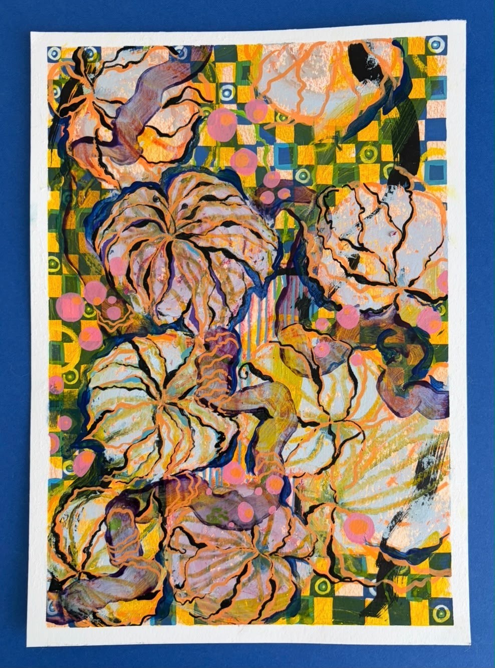 Peach botanical forms over a green and yellow patterned ground