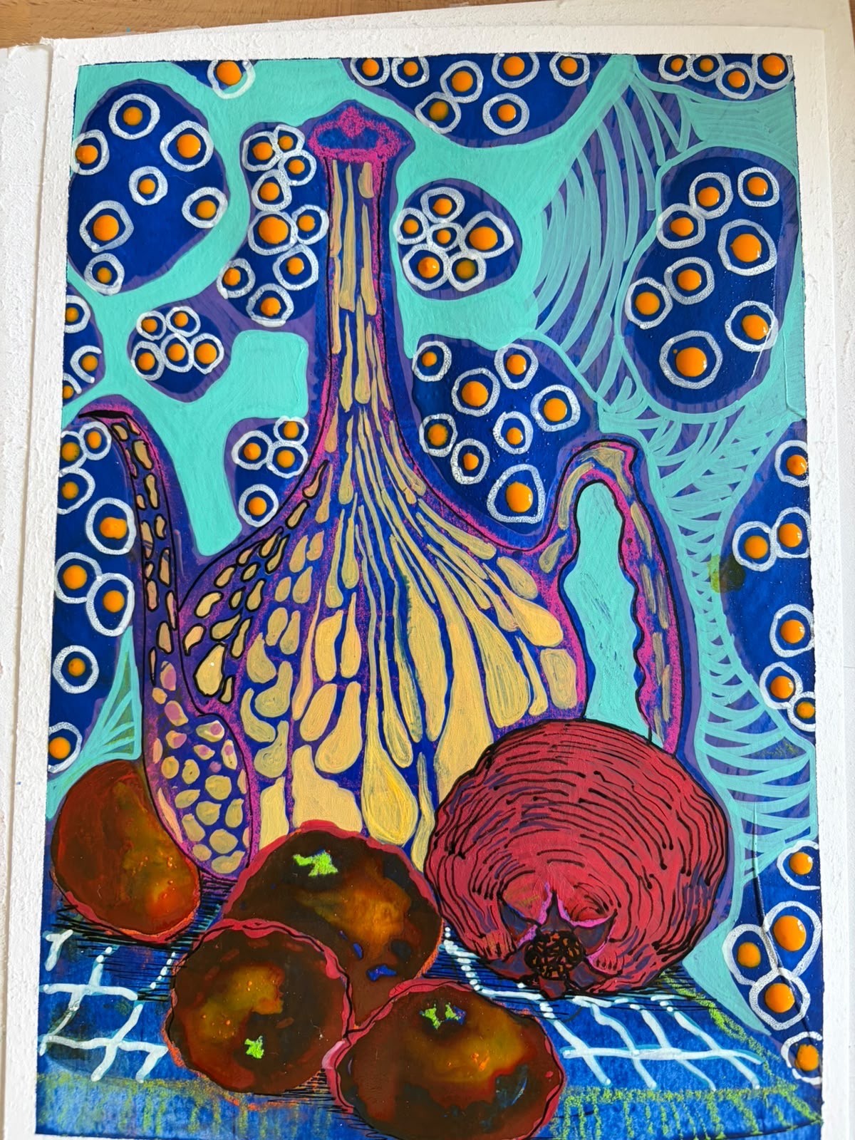 Colorful still life of vessels and fruit with turquoise and cobalt patterns